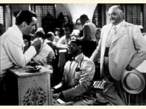 Dooley Wilson i midten - med Humphrey Bogart til venstre og Sydney Greenstreet til højre.