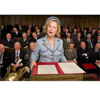 Thatcher omgivet af mænd i hendes periode som upopulær undervisningsminister